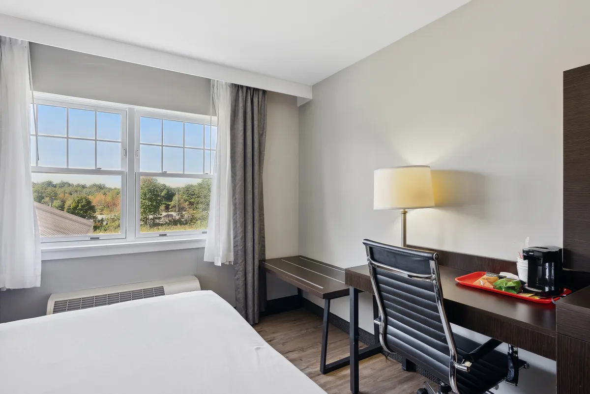 Guest room desk and work area at Saco Bay Hotel